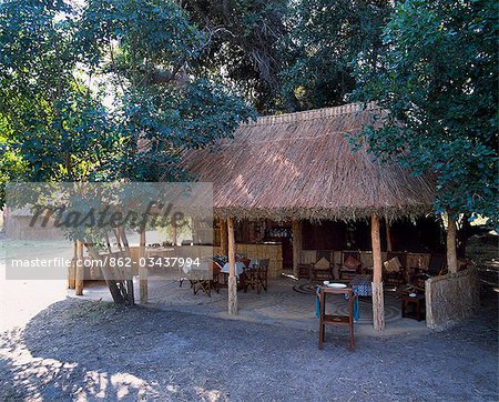 Grass thatched dining room & lounge,Kuyenda Bushcamp