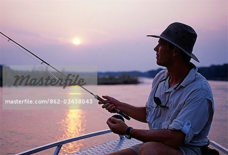 Zambia,Lower Zambezi National Park. Fly-fishing for tiger fish on the Zambezi River.