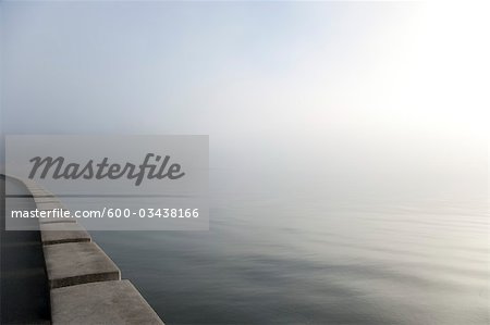 Seawall and Fog over Water