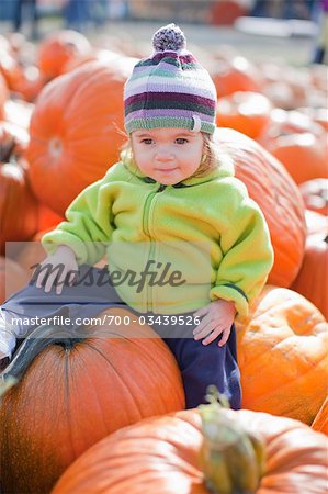 Baby Girl in Pumpkin Patch, Near Portland, Oregon, USA