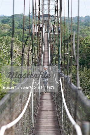 Boy on Footbridge, Sacha Lodge, Quito, Ecuador