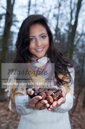 Woman With a Handful of Chestnuts