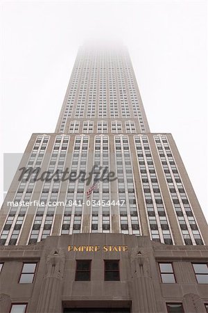 Empire State Building shrouded in mist, Manhattan, New York City, New York, United States of America, North America