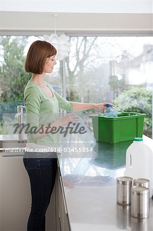 Woman doing recycling