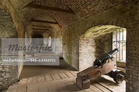 Dover Castle. View of the caponier leading to the spur with a cannon in the foreground.