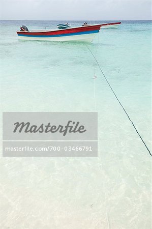 Boats Anchored on Tropical Beach, San Blas Islands, Panama