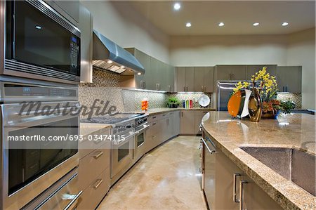 Architecturally designed kitchen with stainless steel fitted units