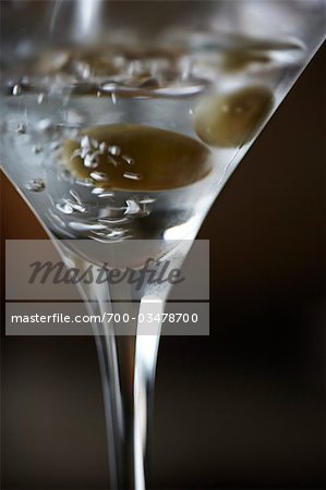 Vodka being Poured into Martini Glass