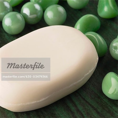 Close-up of a bar of soap with bath beads