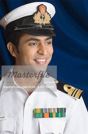 Close-up of a navy officer smiling