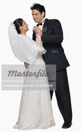 Newlywed couple dancing