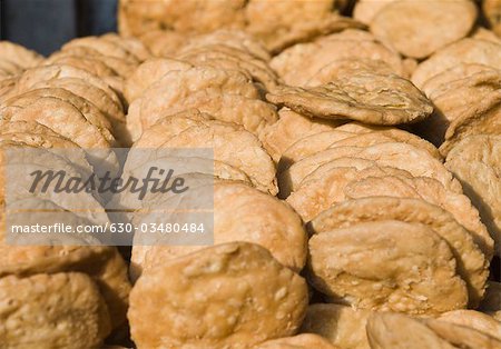 Close-up of fried crackers on a stall, Delhi, India
