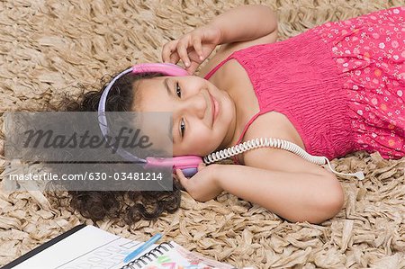 Close-up of a girl listening to headphones