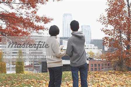 Couple Overlooking City from Park