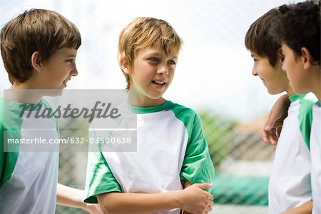 Boys chatting outdoors