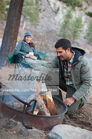 Couple around Campfire, Truckee, near Lake Tahoe, California, USA
