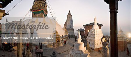 A panorama formed of three frames giving a very wide angle view, taken at dawn at the Buddhist stupa of Swayambu (Swayambhunath) (Monkey Temple), overlooking the Kathmandu valley, UNESCO World Heritage Site, Kathmandu, Nepal, Asia