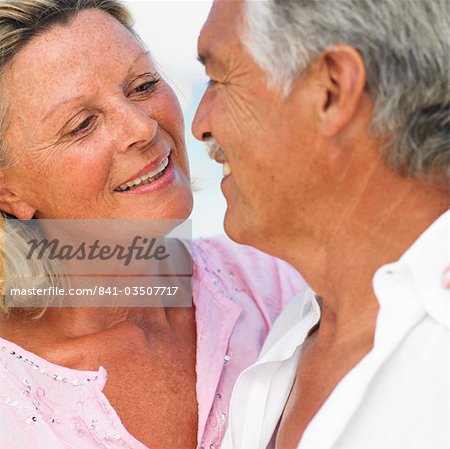 senior couple on beach, close-up