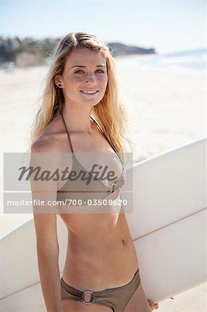 Surfer Girl at Zuma Beach, Malibu, California, USA