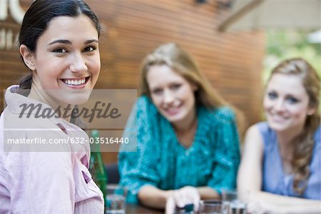 Young woman relaxing with friends