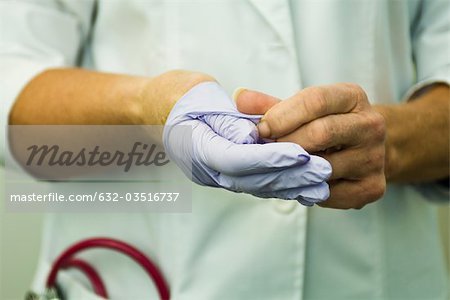 Taking off disposable latex glove