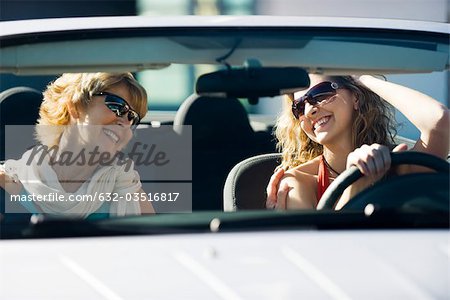 Mother and adult daughter out together in car