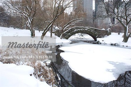 The Gapstow Bridge in early morning after a snowfall in Central Park, New York State, New York City, United States of America