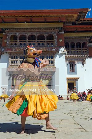 Dancers in costume at Tsechu (festival), Gangtey Gompa (Monastery), Phobjikha Valley, Bhutan, Asia