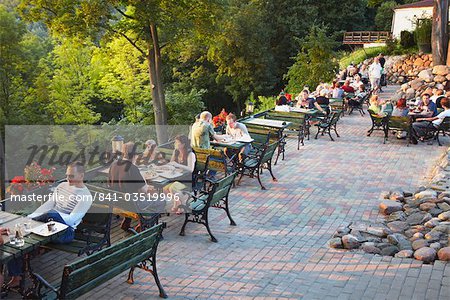 People sitting on patio at Tores Restaurant, Uzupis District, Vilnius, Uzupis District, Lithuania, Baltic States, Europe