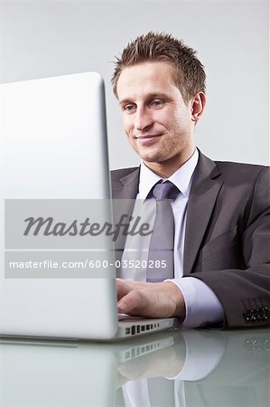 Businessman Using Laptop Computer