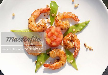 Salted shrimps with almonds, mangetout and tomato tartare