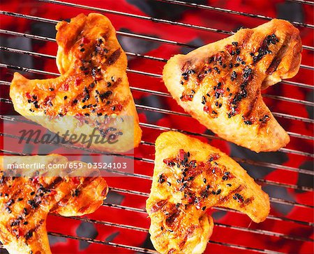 Chicken wings on a barbecue Chicken wings on a barbecue