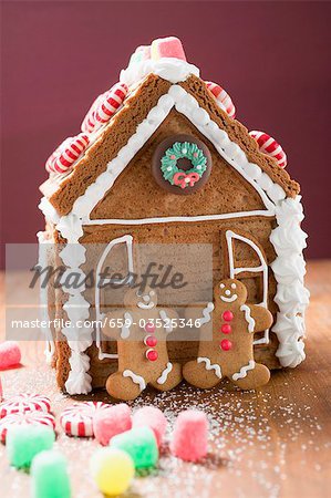 Gingerbread house with two gingerbread men