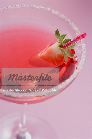 Martini with liqueur & strawberry in glass with sugared rim Martini with liqueur & strawberry in glass with sugared rim