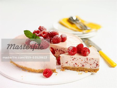 Raspberry cheesecake, a piece cut