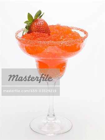 Frozen Strawberry Daiquiri in glass with fresh strawberry Frozen Strawberry Daiquiri in glass with fresh strawberry