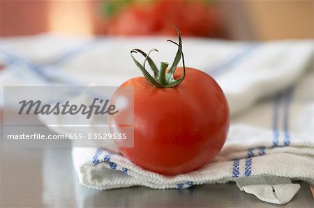 Tomato on tea towel