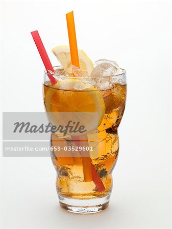 Rum drink with ice cubes and lemon Rum drink with ice cubes and lemon