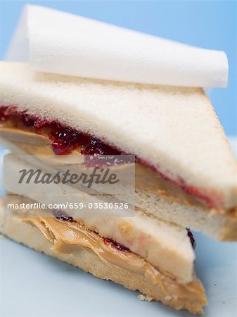 Two peanut butter and jelly sandwiches