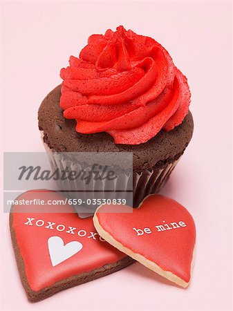Chocolate cupcake with red cream rosette