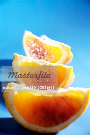 Three wedges of blood orange