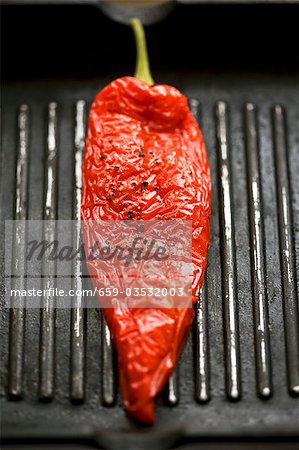 Red pepper in a grill frying pan