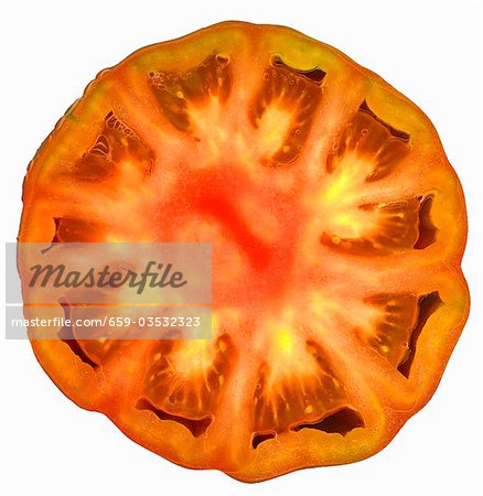 Half a beefsteak tomato (overhead view)