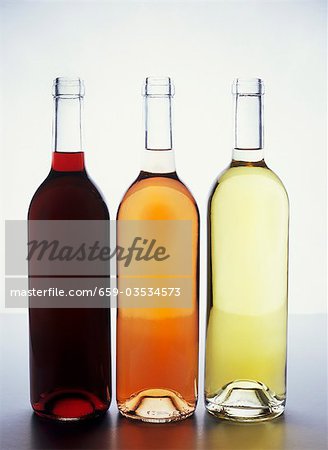 Three bottles of wine: red, rosÈ and white