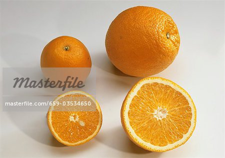 Oranges, whole and halved