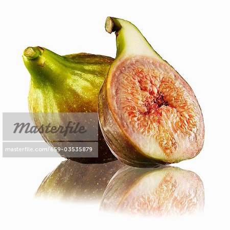 Whole fig and half a fig with reflection