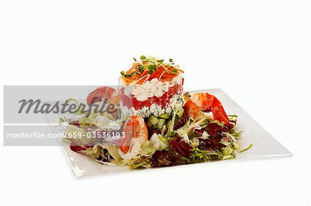 Tower of crab salad, tomatoes and blue cheese