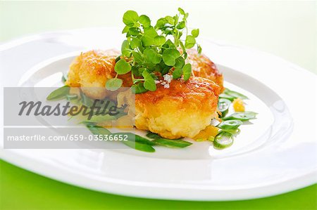 Fried breaded scallops with watercress