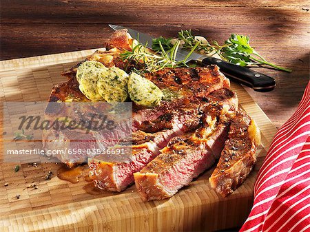 Grilled Porterhouse steak with herb butter