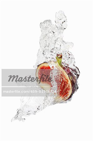 Half a fig with splashing vodka